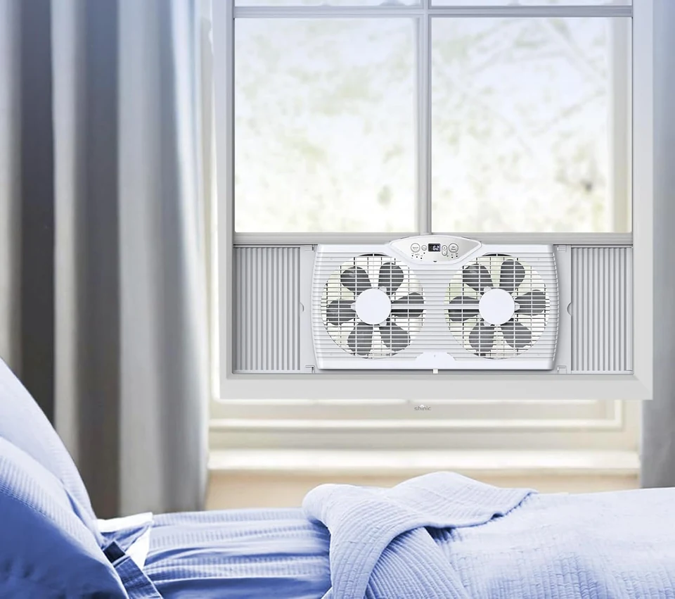 SHINIC window fan in a bedroom